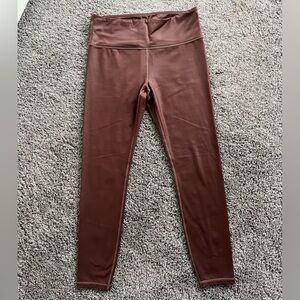 Athleta wine colored leggings with slight sparkle- Size M